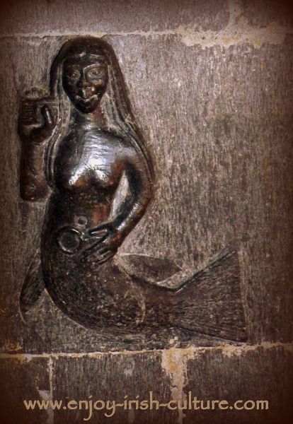 Mermaid carving inside Clonfert Cathedral, a remarkable Irish heritage site in County Galway, Ireland.