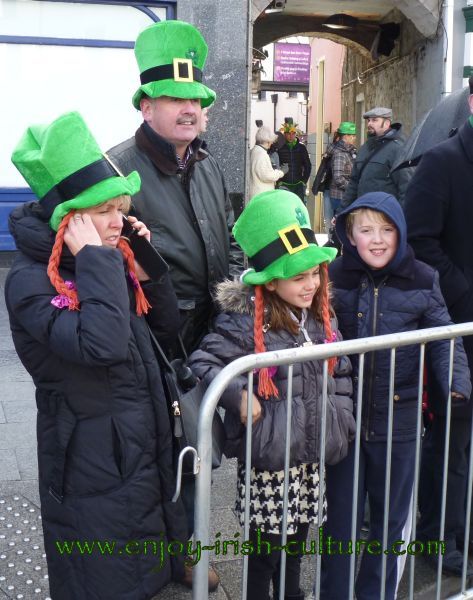 St Paddy's Day Parade Galway 2013, family wearing green hats