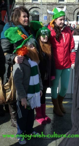 St Patricks Day in Ireland, a family posing to have their picture taken